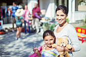 Portrait of mother and daughter shopping