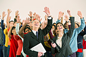 Business people waving