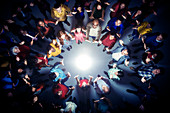 Business people forming circle