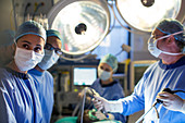 Team of surgeons during operation