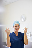 Doctor wearing surgical cap and gown