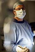 Surgeon wearing surgical mask