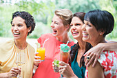 Women smiling together at party