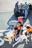 People rushing to injured girl in street