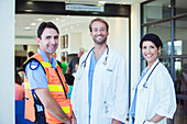 Doctors and paramedic smiling
