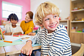 Student smiling in classroom