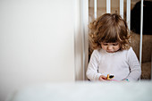 Girl eating snack on stairs