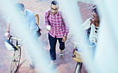 Friends walking on city street