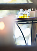 Essential oils and candles on table
