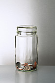 Glass change jar on counter