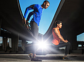 Men stretching before exercising