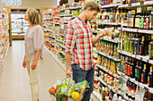 Couple shopping together in grocery store