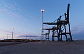 Cargo cranes at night