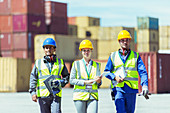 Businesswoman and workers walking