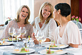 Women enjoying meal in restaurant
