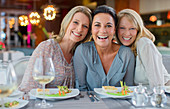 Portrait of smiling women in restaurant