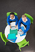 Boy and girl with digital tablets