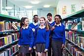 Students walking in library