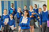 Schoolchildren standing and smiling