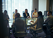 Business people attending meeting