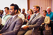 Business people attending meeting