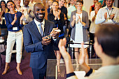 Man holding trophy