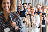 Group of people applauding