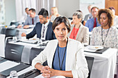 Portrait of woman with Business people