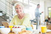 Older woman at breakfast table