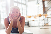 Older woman relaxing on floor