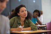 University student looking up during exam