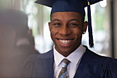 Male student wearing graduation clothes