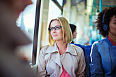 Businesswoman sitting on train