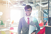 Businessman holding laptop