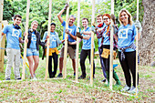 Volunteers holding construction frame