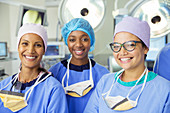 Portrait of smiling female surgeons