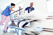 Doctors and nurse rushing patient