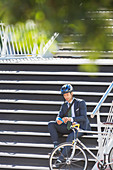 Businessman and bicycle texting