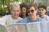 Friends looking at map
