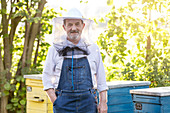 Portrait confident beekeeper