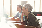 Attentive senior woman listening