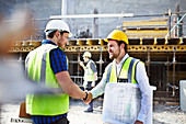 Worker with blueprints handshaking