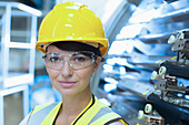 Worker in hard-hat and protective eyewear