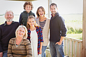 Multi-generation family on sunny porch