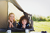 Portrait brother and sister in tent