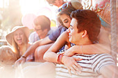 Young couple kissing summer outdoors