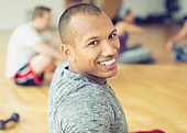 Portrait smiling man in exercise class