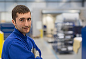 Portrait confident worker in factory
