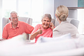 Senior woman gesturing thumbs up