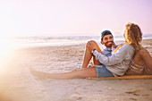 Smiling couple relaxing and talking